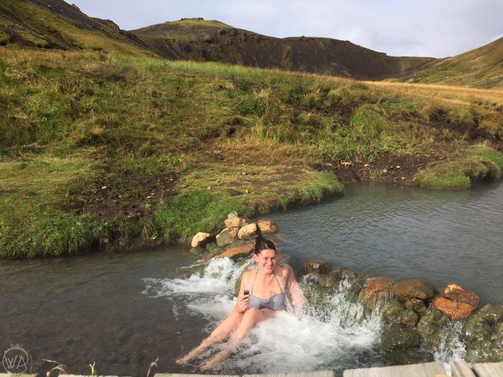 Iceland off the beaten path with hidden gems map - Girl in a hot river Iceland