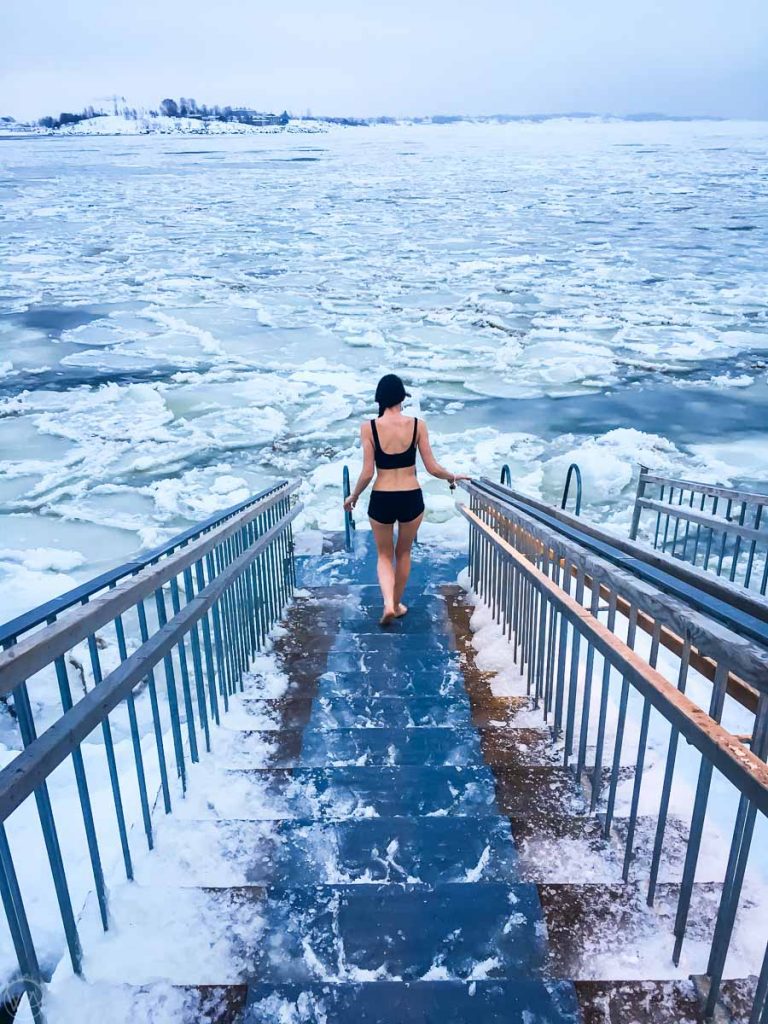 Ice swimming after Finnish sauna, Helsinki, Finland