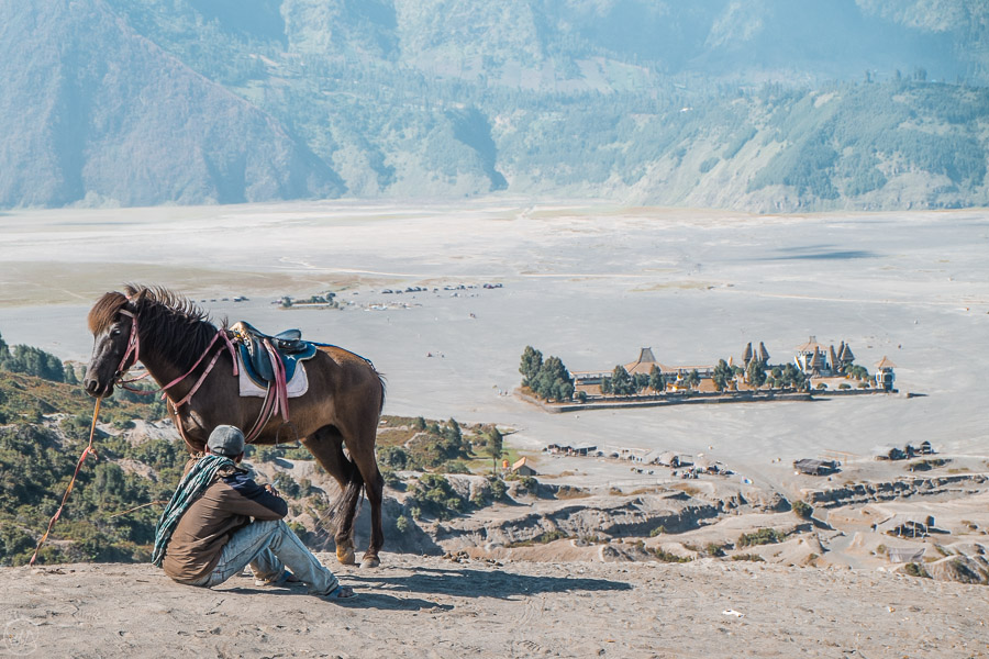View to the Sea of Sand and the Hindu temple in Mount Bromo hike