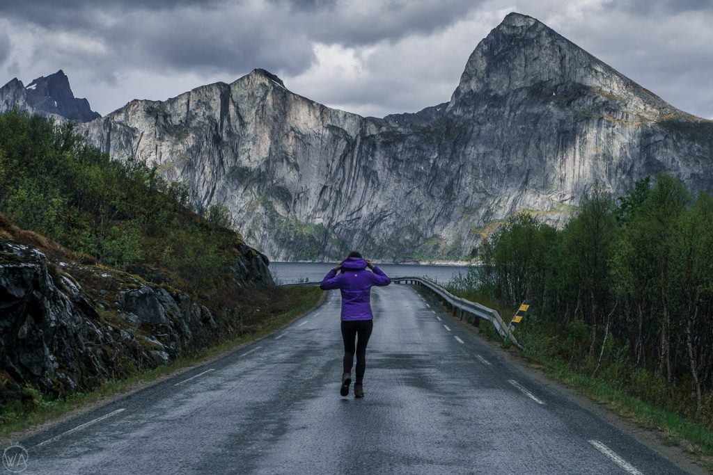 Girl in Norwegian mountains wearing waterproof jacket from the Norway packing list